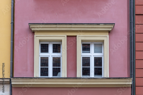 Windows of an old building in Paris, France. Architectural background