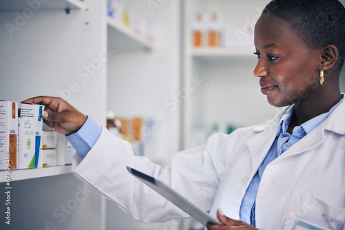 Black woman, tablet and pharmacist with checklist for pills, stock of medicine or information on drugs. Digital list, pharmacy and medical professional with box for online inventory for telehealth.