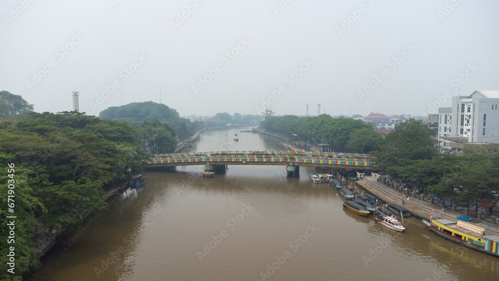 Banjarmasin's Siring river area which is filled with rental engine boats used for Banjarmasin river tourism