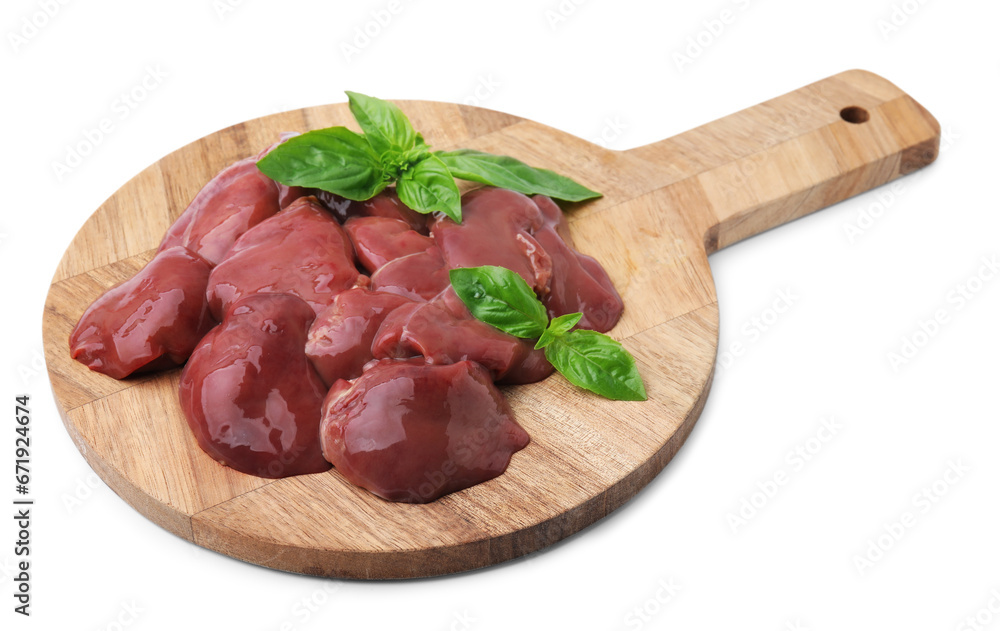 Wooden board with pieces of raw chicken liver isolated on white