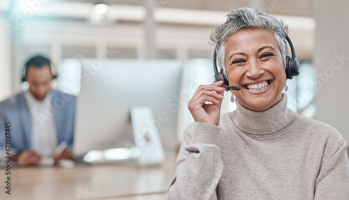 Call center, mature and face of woman with microphone in office for telemarketing, support or contact. Smile, portrait and customer service professional, sales manager or happy consultant listening