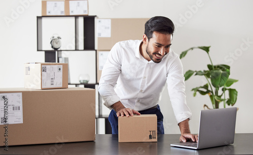 Laptop, box and business Asian man for logistics startup for shipping, delivery and distribution service. Ecommerce, supply chain and male person on computer planning for package, parcel and order © JLJ/peopleimages.com