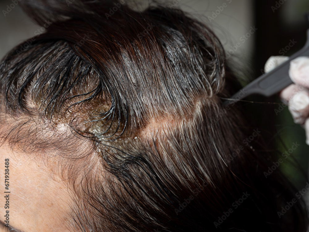 Fototapeta premium Close-up of dyeing hair 