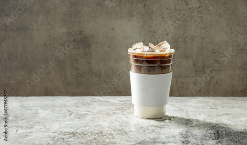 Fotografie Iced Americano in a take-out container