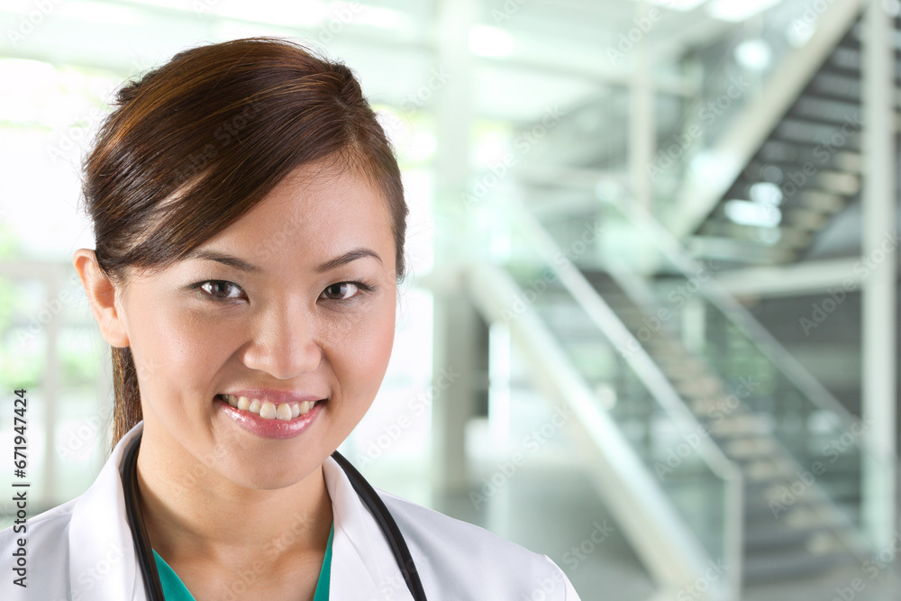 Fototapeta premium Portrait of a happy Female Doctor