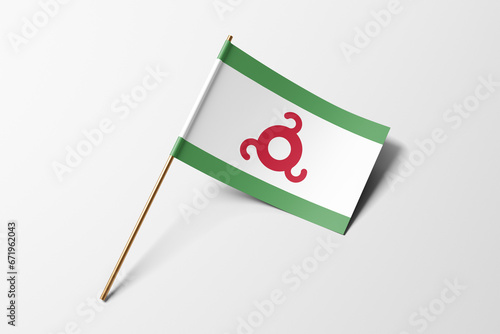 Ingushetia flag of small paper, isolated on white background photo