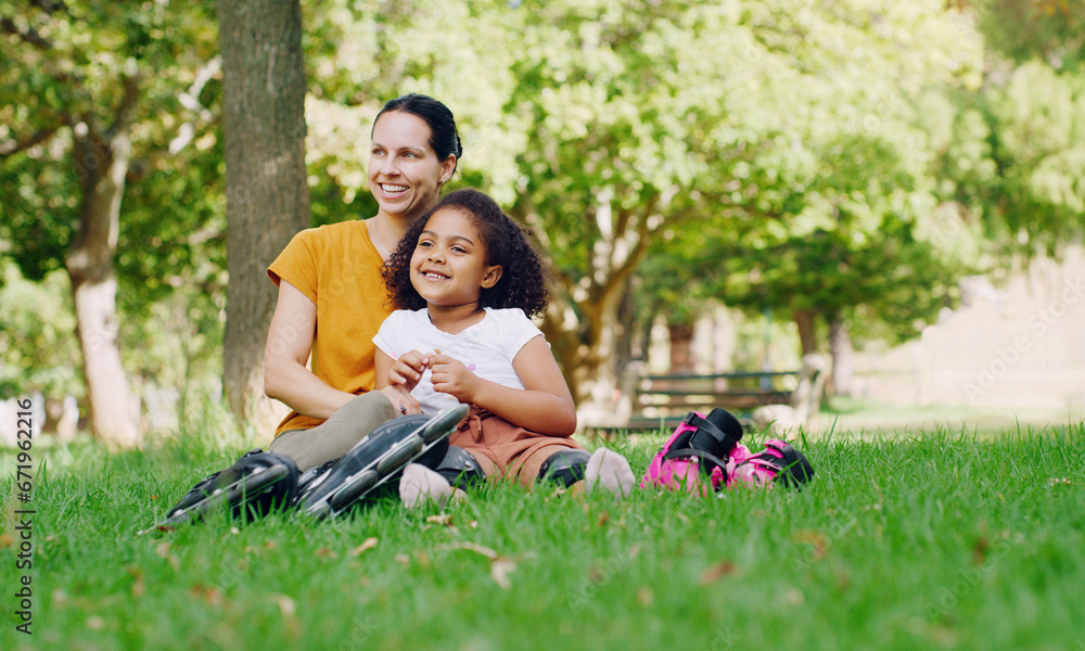 Fototapeta premium Family, mother and kid in park with rollerblading outdoor, relax on grass and fun in nature with happy people. Woman, girl and taking a break, sports and quality time together with love and care