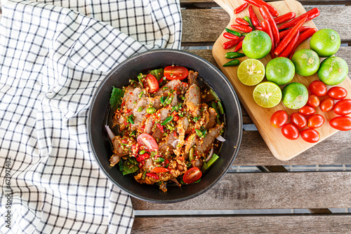 Spicy fried pork neck salad. Spicy. Very delicious.