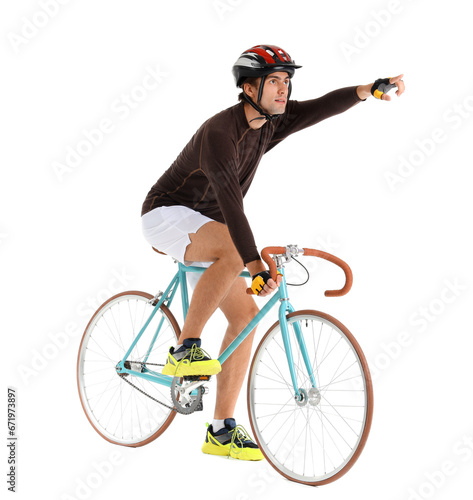 Young male cyclist riding b...