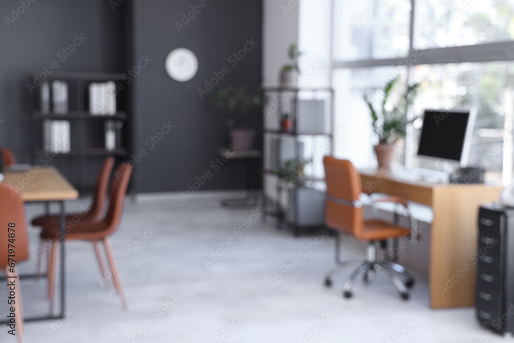 Fototapeta premium Blurred view of conference hall with tables in office