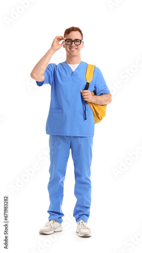 Male medical student on white background