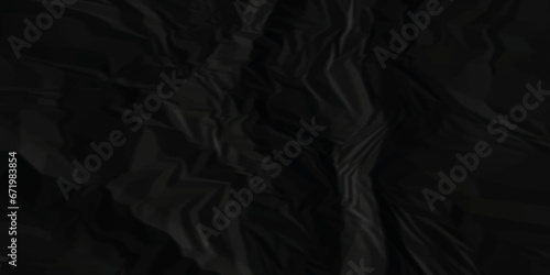 Dark black crumpled paper texture. black wrinkled paper texture. Black paper texture. Black crumpled and top view textures can be used for background of text or any contents.