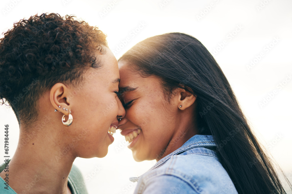 Lesbian couple, love and intimate outdoor at sunset, bonding and romance on date together. Happy, gay women and forehead touch for care, commitment and loyalty, trust and support for lgbtq people Lesbian couple, love and intimate outdoor at sunset, bonding and romance on date together. Happy, gay women and forehead touch for care, commitment and loyalty, trust and support for lgbtq people