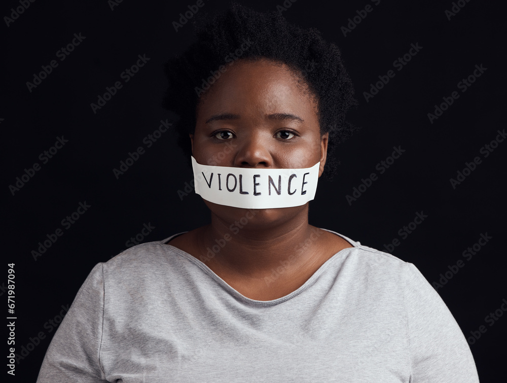 Portrait, censorship and a black woman in protest of domestic violence on a dark background. Freedom, gender equality or empowerment with a serious young female person in studio for human rights - obrazy, fototapety, plakaty 