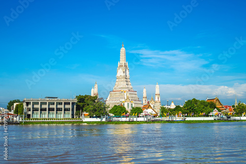Wat Arun at the bank of Chao Phraya River in Bangkok, thailand