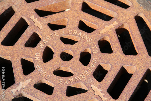 Sewer Drain Grate Iron Lid Roadway Inlet Public Works photo