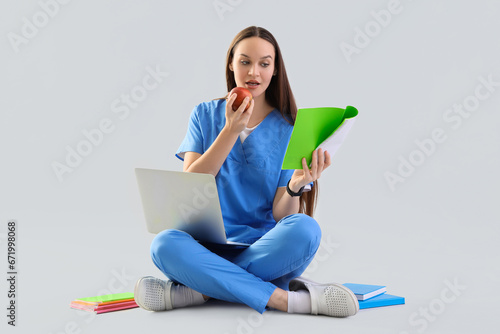 Female medical intern with ...