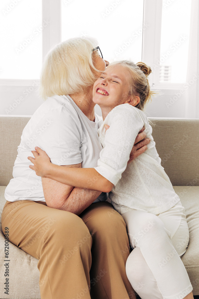 Girl grandmother granddaughter child couch Girl grandmother granddaughter child couch