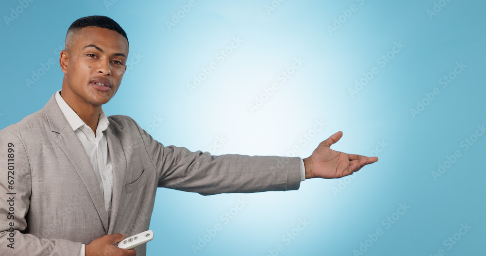 Weather forecast, portrait or man talking with hands for mockup space on blue background. Reporter, anchor or presenter in broadcast for presentation, climate change prediction or news in studio Weather forecast, portrait or man talking with hands for mockup space on blue background. Reporter, anchor or presenter in broadcast for presentation, climate change prediction or news in studio