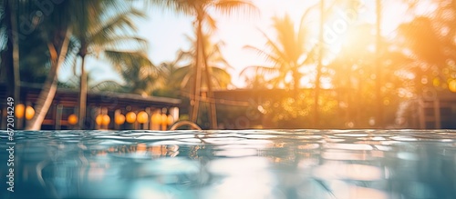 Luxurious resort with a defocused abstract image of a swimming pool as a background