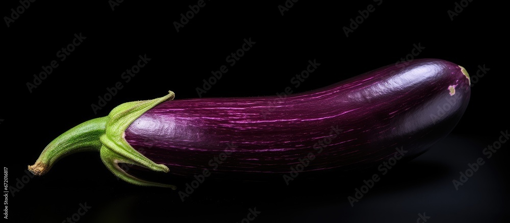Manipulating a photograph of a solitary eggplant Manipulating a photograph of a solitary eggplant