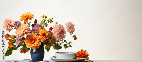 Flowers arranged on a white background create an aesthetically pleasing table decor