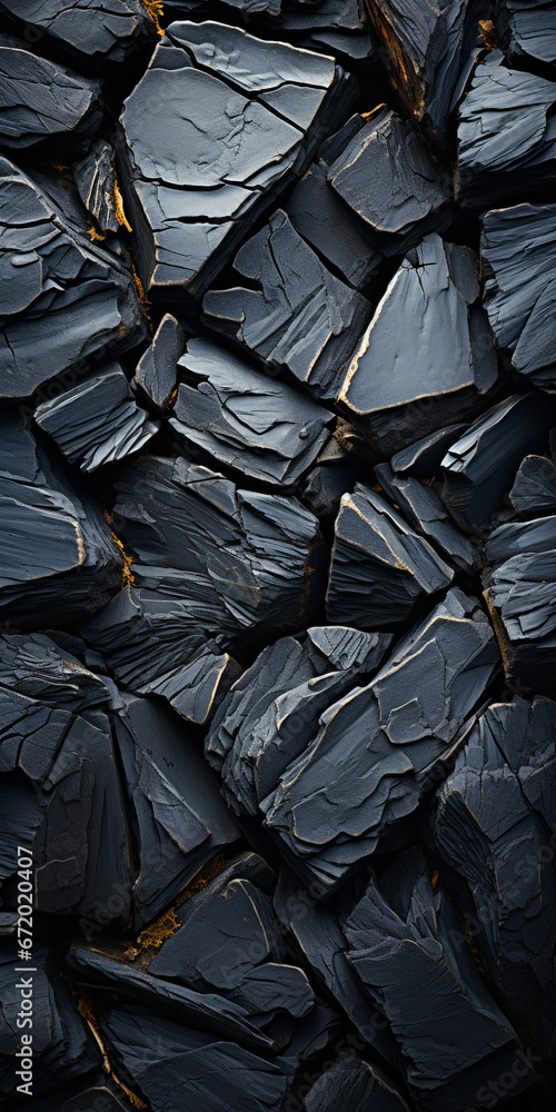 Black lava coal background. Top view of charcoal texture Black lava coal background. Top view of charcoal texture