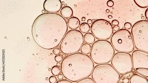 Wallpaper Mural Bubble cluster, cells under a microscope. Transparent cosmetic gel fluid with molecule bubbles oil distribution. Macro Shot of Natural Organic Cosmetics, Medicine. Production Close-up. Slow Motion.  Torontodigital.ca