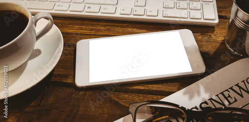 Digital png illustration of smartphone with copy space on table on transparent background