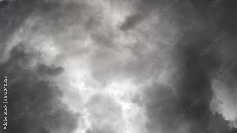 view of a thunderstorm in the dark clouds and lightning view of a thunderstorm in the dark clouds and lightning