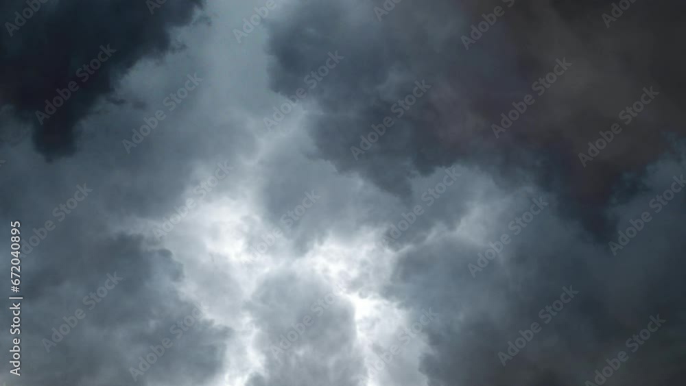 Dark clouds and  lightning strikes in the dark clouds