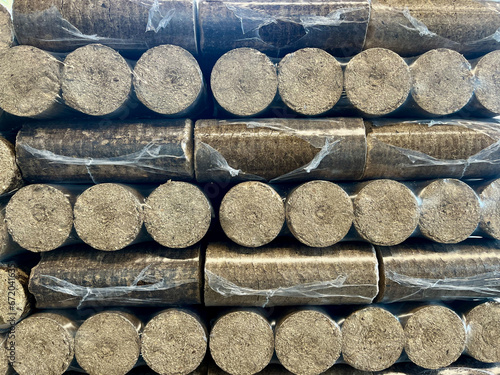 Wood briquettes for heating, packed in plastic film