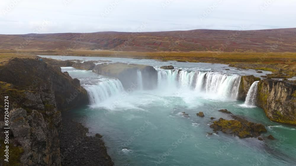 Slow orbiting shot of the beautiful Godafoss waterfall in the Iceland countryside Slow orbiting shot of the beautiful Godafoss waterfall in the Iceland countryside