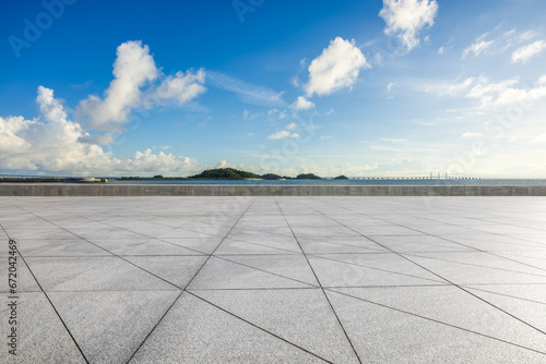 Empty square floor and coastline natural landscape under blue sky