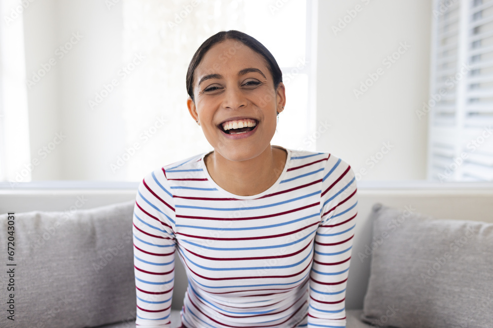 Portrait of happy biracial woman having video call at home Portrait of happy biracial woman having video call at home