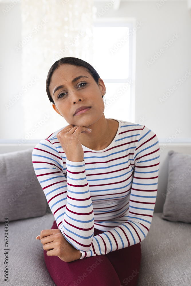 Portrait of sad biracial woman having video call at home Portrait of sad biracial woman having video call at home