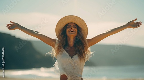 Portrait of one young woman at the beach with open arms enjoying free time and freedom outdoors. #672047438