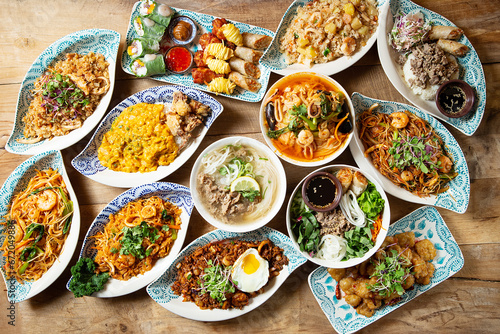 Various Southeast Asian food on the table