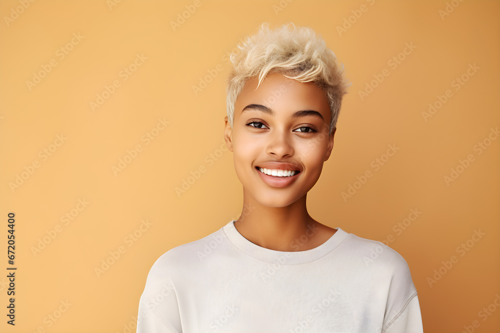 Young adult happy Black woman beauty female model, pretty cool gen z African lady with short blond hair healthy face skin and nose piercing looking at camera isolated at beige background Young adult happy Black woman beauty female model, pretty cool gen z African lady with short blond hair healthy face skin and nose piercing looking at camera isolated at beige background