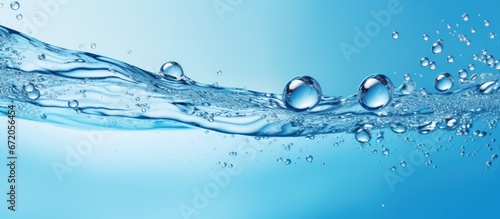 A water background with imaginative bubbles floating on its blue surface