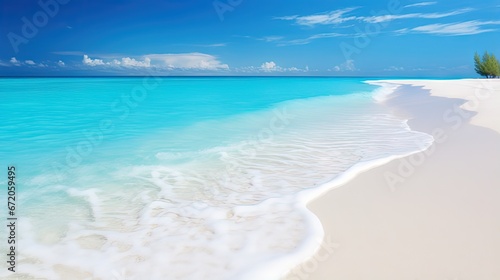 Panorama of a beautiful white sand beach and turquoise water in Maldives. Holiday summer beach background.. Wave of the sea on the sand beach. © HN Works