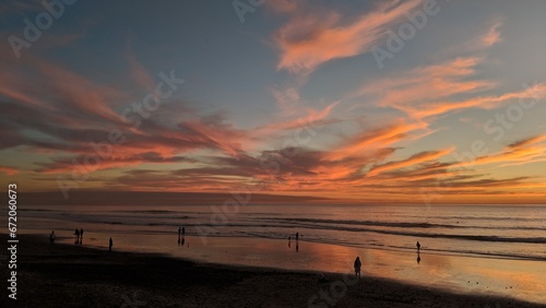 Southern California beach scenes with sunsets  surfers  tide pools and palms trees at Swamis Reef Surf Park Encinitas California.  