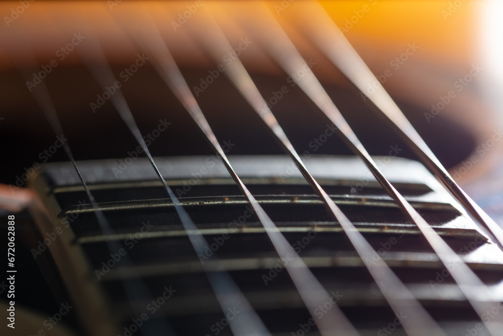 Fototapeta premium Strings on an acoustic guitar. Close-up