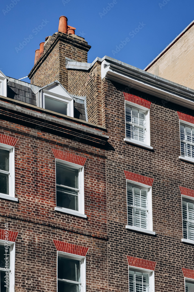 Facade in the beautiful Mayfair district in the West End of London, on an autumn warm day