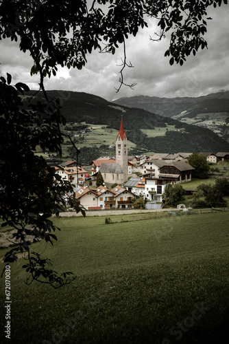 view from Albions and its church, a little mountain town in the Dolomites photo