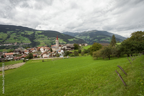 view from Albions and its church, a little mountain town in the Dolomites photo