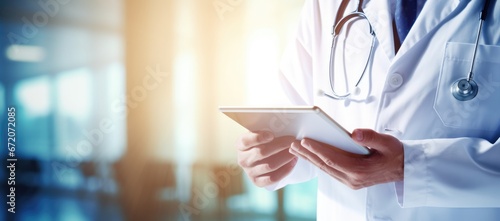 Healthcare and medicine. Doctor working on digital tablet on hospital Medical and technology. background