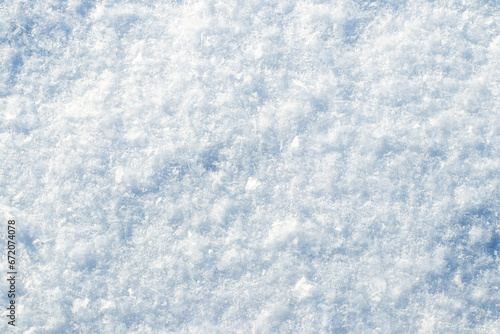 Background with snow texture, snow surface on a sunny day