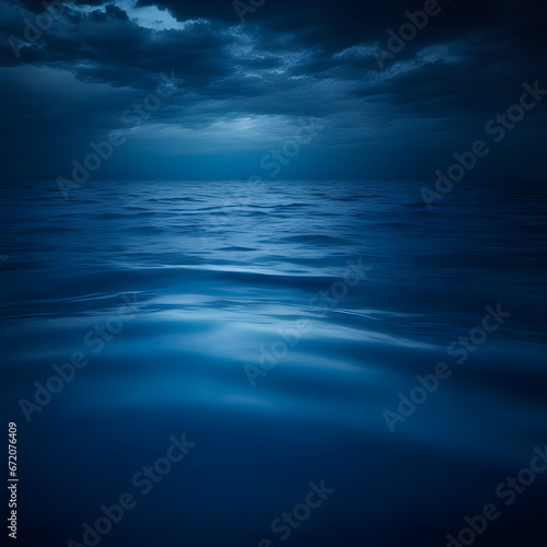 Ocean landscape. Silhouette concept. Close-up minimal image of waves in dark blue lake water.