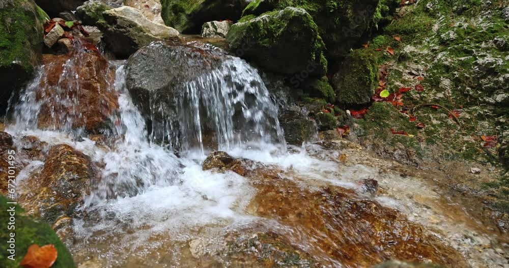 Autumn landscape with waterfall on a wild brook. The rocky gorge Dolne diery in The Mala Fatra National Park, Slovakia, Europe. Slow motion 4k 100fps. Autumn landscape with waterfall on a wild brook. The rocky gorge Dolne diery in The Mala Fatra National Park, Slovakia, Europe. Slow motion 4k 100fps.